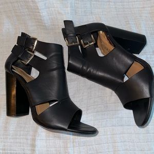 Black open toe bootie with cutouts. Size 10. Leila Stone brand from Shoedazzle